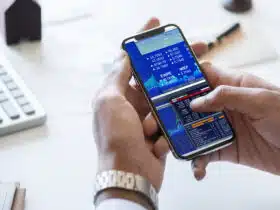 businessman checking stock market online