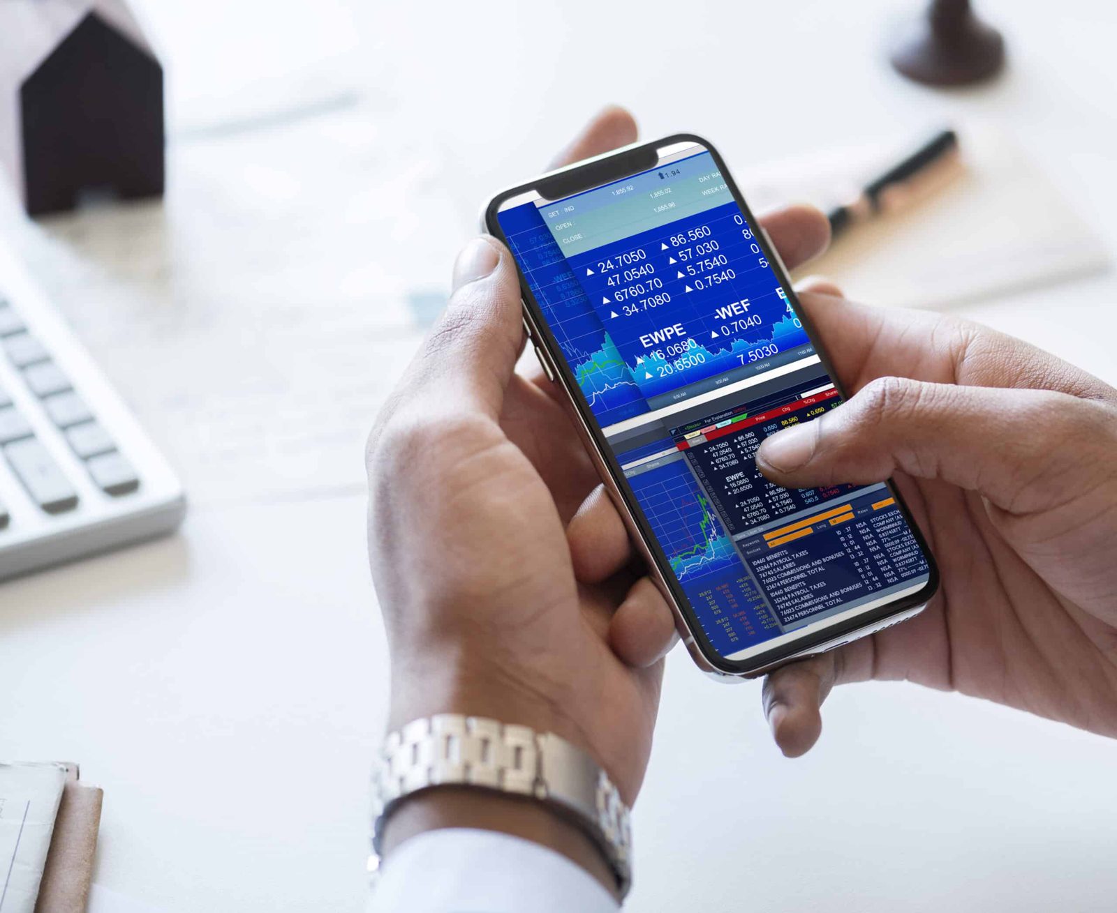 businessman checking stock market online